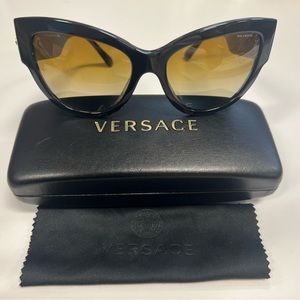 POLARIZED BLACK AND GOLD VERSACE GLASSES